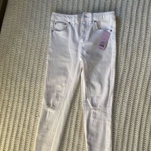 White skinny jeans with fringe bottom